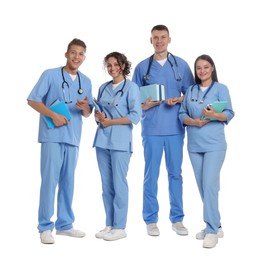 Photo of Group of happy medical students on white background