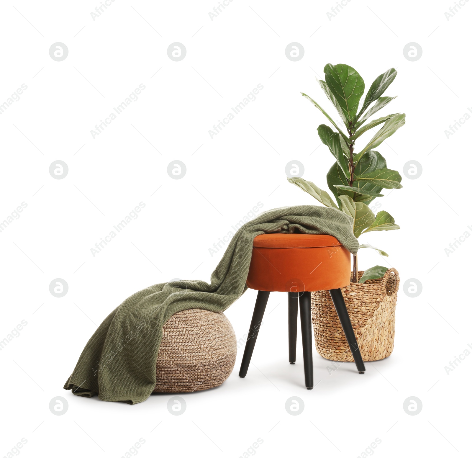 Stylish pouf and home decor isolated on white Photo of Stylish pouf and home decor isolated on white