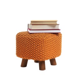Photo of Stylish pouf with books isolated on white
