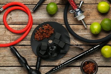 Photo of Hookah, coal and fresh fruits on wooden table, flat lay