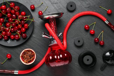 Photo of Hookah and cherries on black table, flat lay