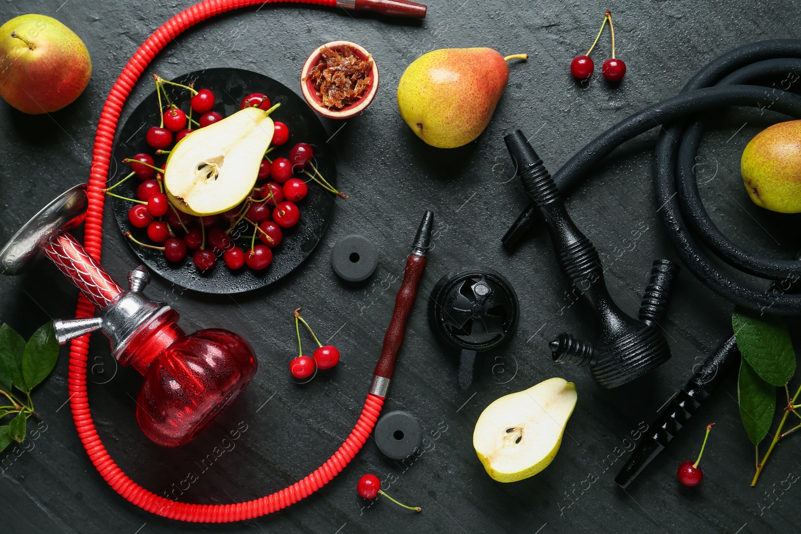 Photo of Hookah and fresh fruits on black table, flat lay