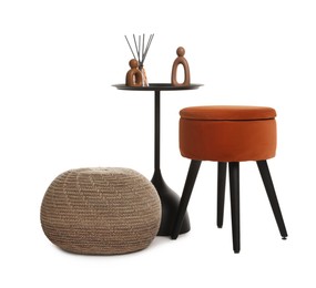 Photo of Stylish pouf and home decor isolated on white