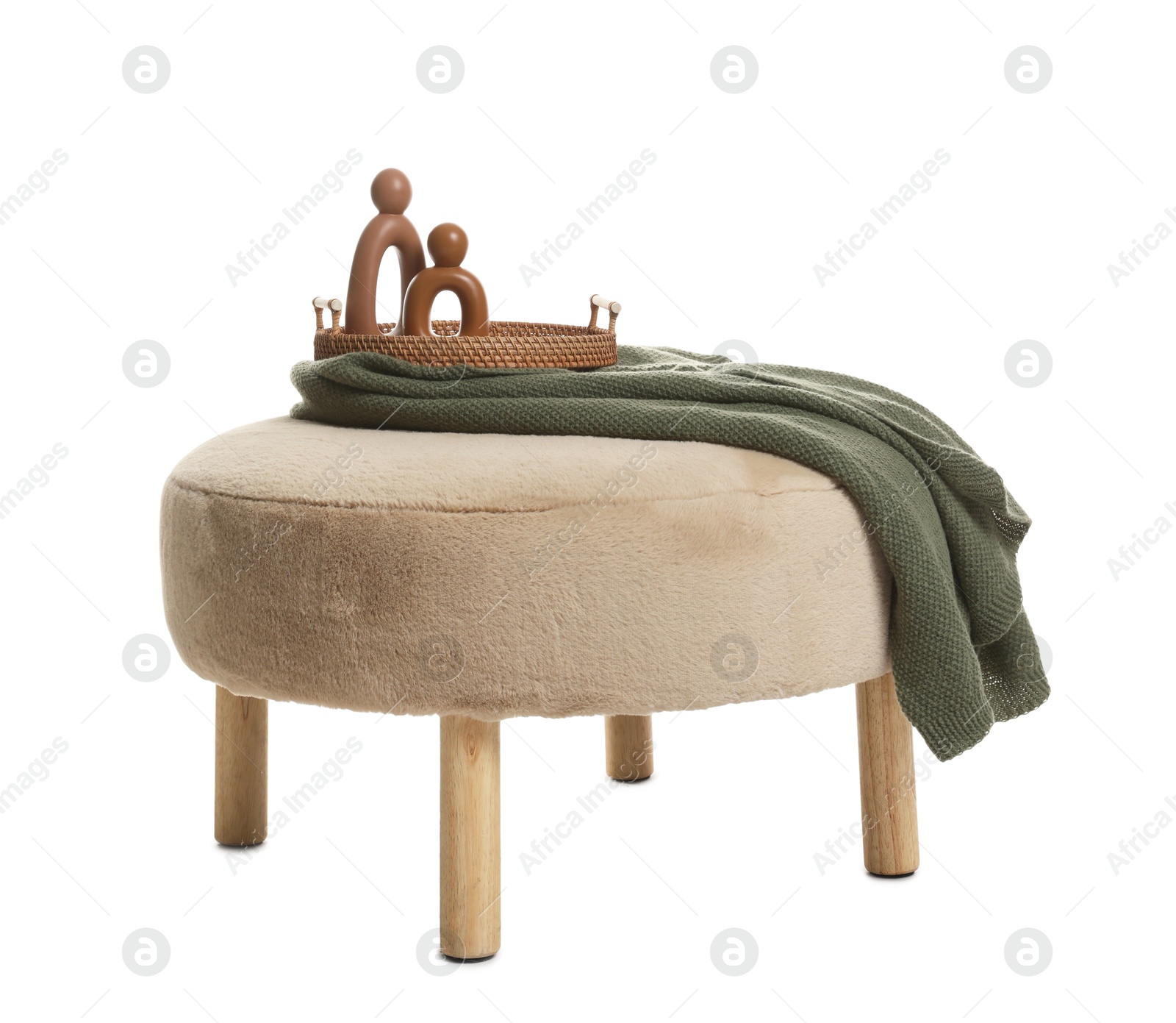 Stylish pouf and home decor isolated on white Photo of Stylish pouf and home decor isolated on white