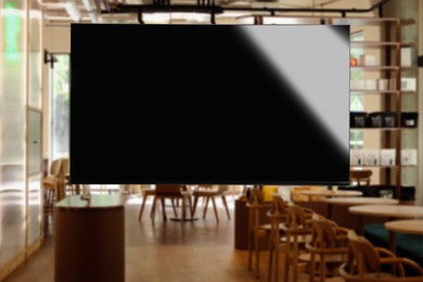 Image of TV set for event broadcasting in bar
