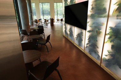 Image of TV set for event broadcasting in bar