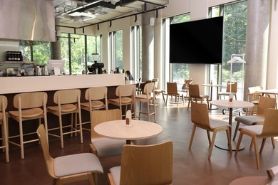 Image of TV set for event broadcasting in bar