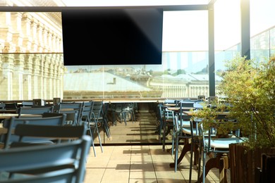 Image of TV set for event broadcasting in bar