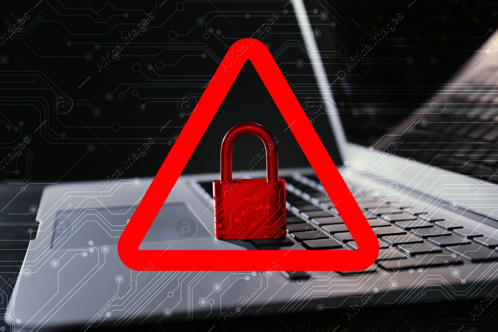 Cyber attack alert notification. Red warning sign with padlock and circuit board pattern. Laptop on table, closeup Image of Cyber attack alert notification. Red warning sign with padlock and circuit board pattern. Laptop on table, closeup