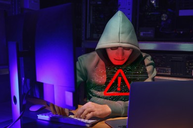 Image of Cyber attack alert notification. Red warning sign and circuit board on virtual screen. Hacker using computers, closeup