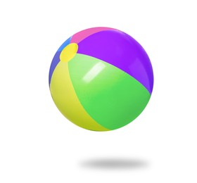 Image of Bright beach ball falling against white background