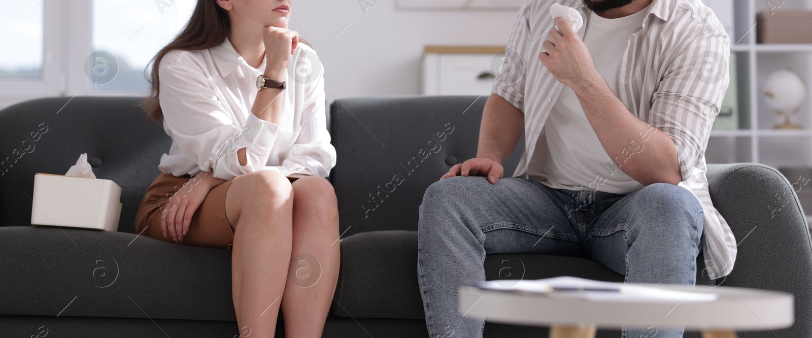 Photo of Professional psychologist working with patient in office, closeup