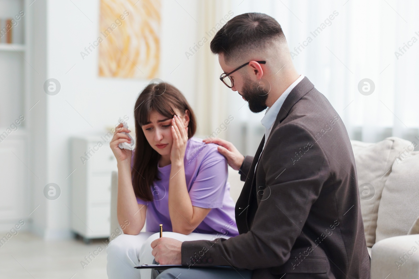 Photo of Professional psychologist working with patient in office