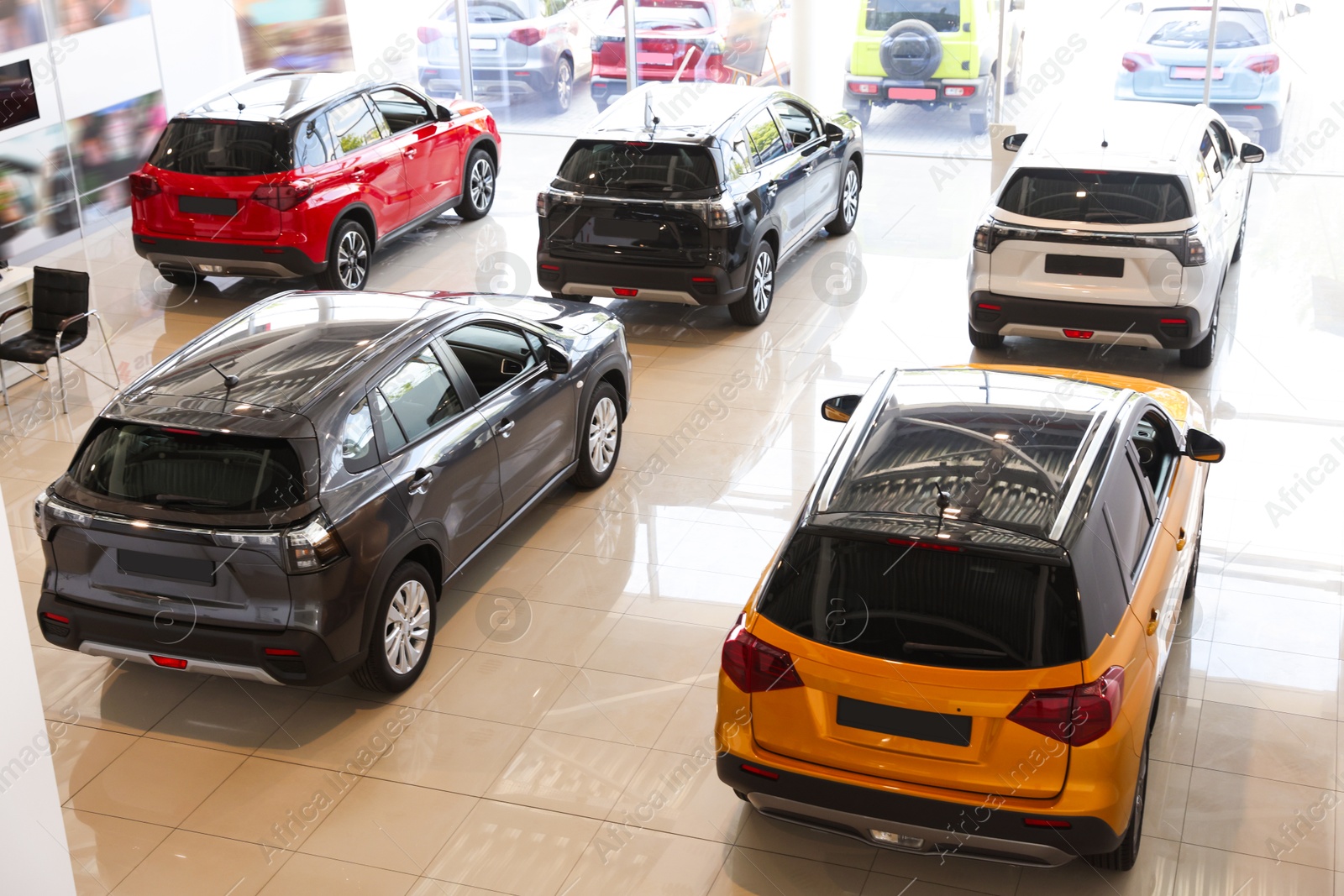 Many luxury new cars in salon. Modern transport Photo of Many luxury new cars in salon. Modern transport