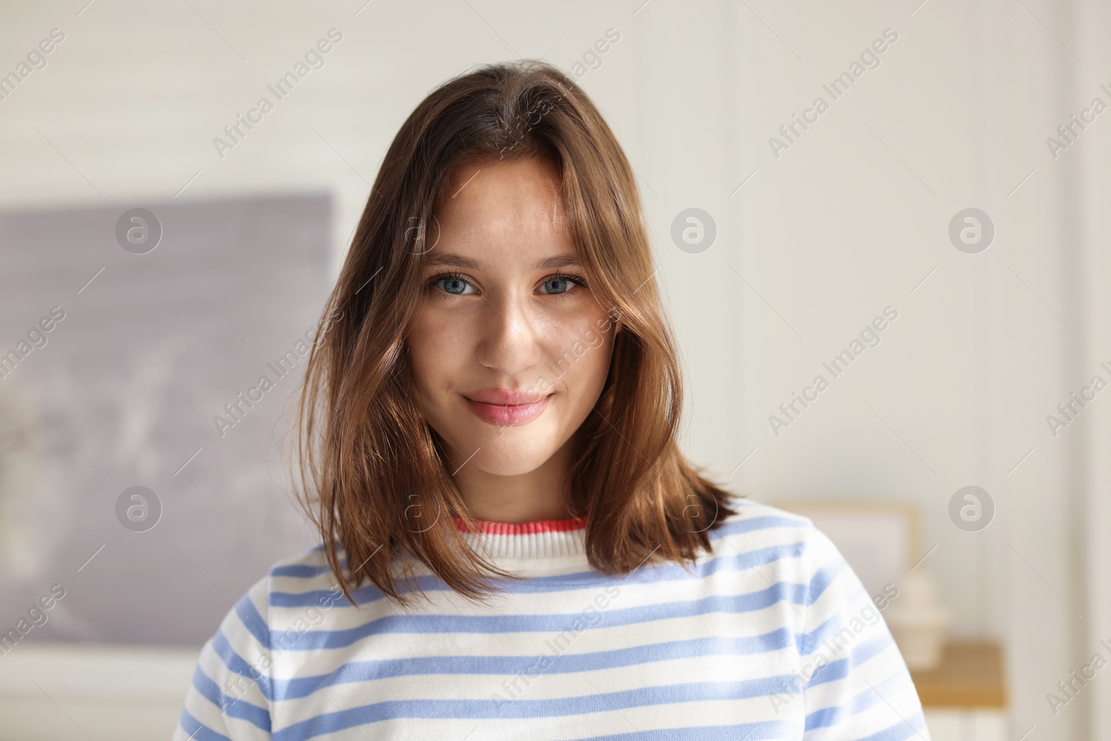 Portrait of beautiful teenage girl at home Photo of Portrait of beautiful teenage girl at home