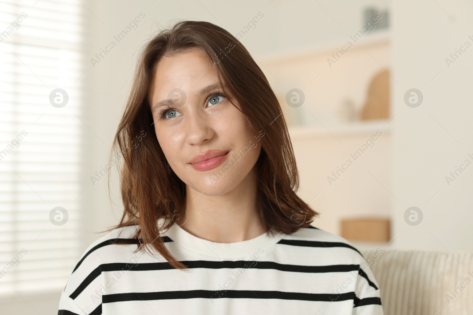 Portrait of beautiful teenage girl at home Photo of Portrait of beautiful teenage girl at home