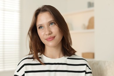 Photo of Portrait of beautiful teenage girl at home