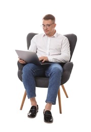 Photo of Psychologist in glasses during online session by laptop sitting on armchair against white background