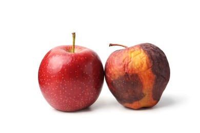 Photo of Rotten apple and fresh one isolated on white