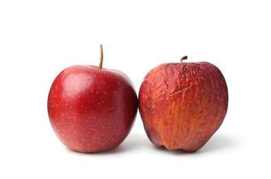 Photo of Rotten apple and fresh one isolated on white