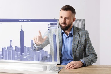 Image of Building information modelling. Man using virtual screen in office