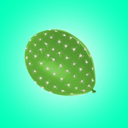 Image of Green balloon covered with cactus prickles on turquoise background