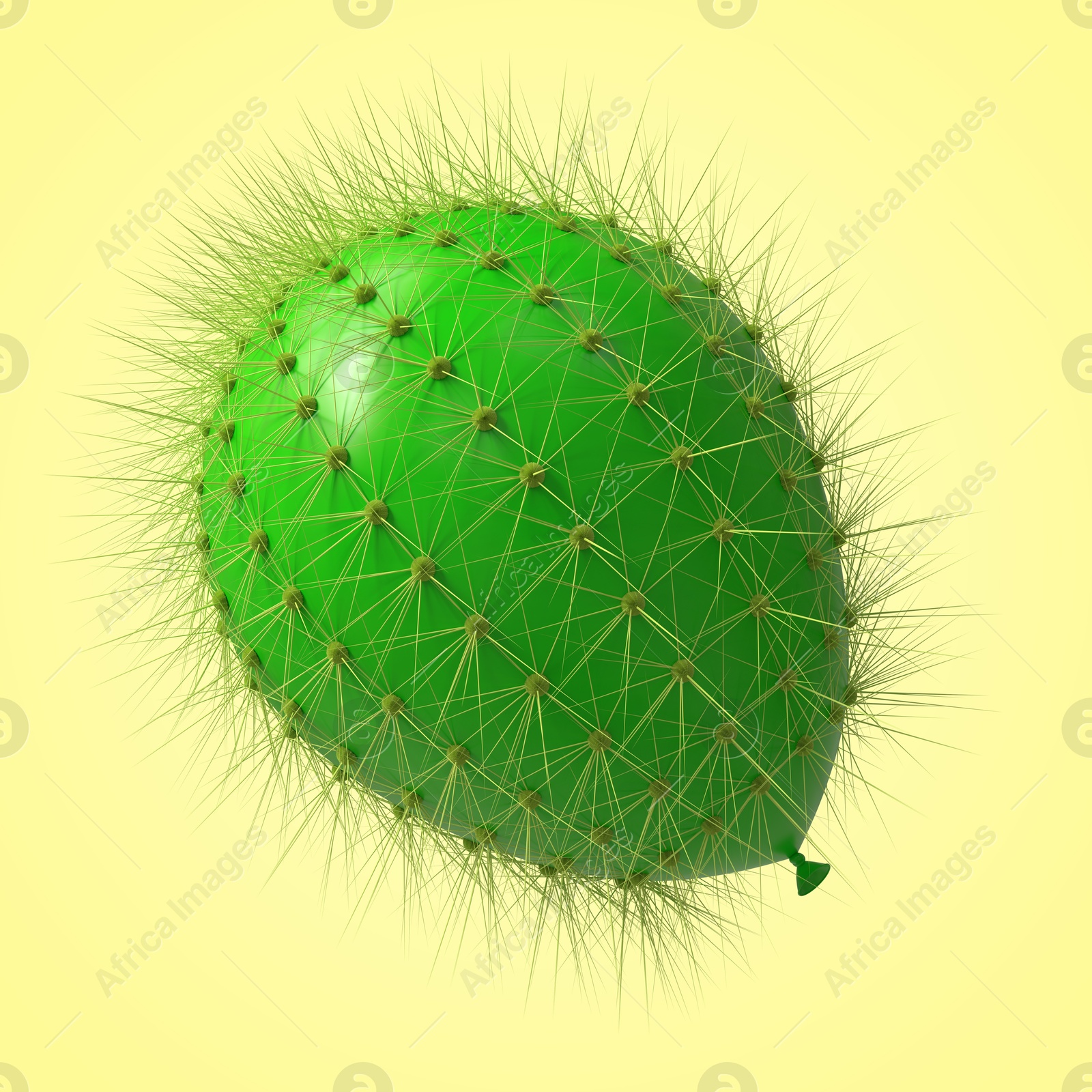 Image of Green balloon covered with cactus prickles on pale yellow background