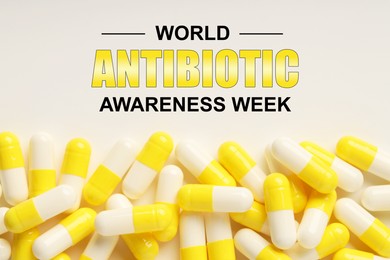 Image of World antibiotic awareness week. Many pills on white background, flat lay