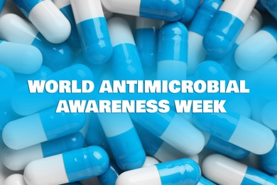 Image of World antibiotic awareness week. Many pills as background, top view