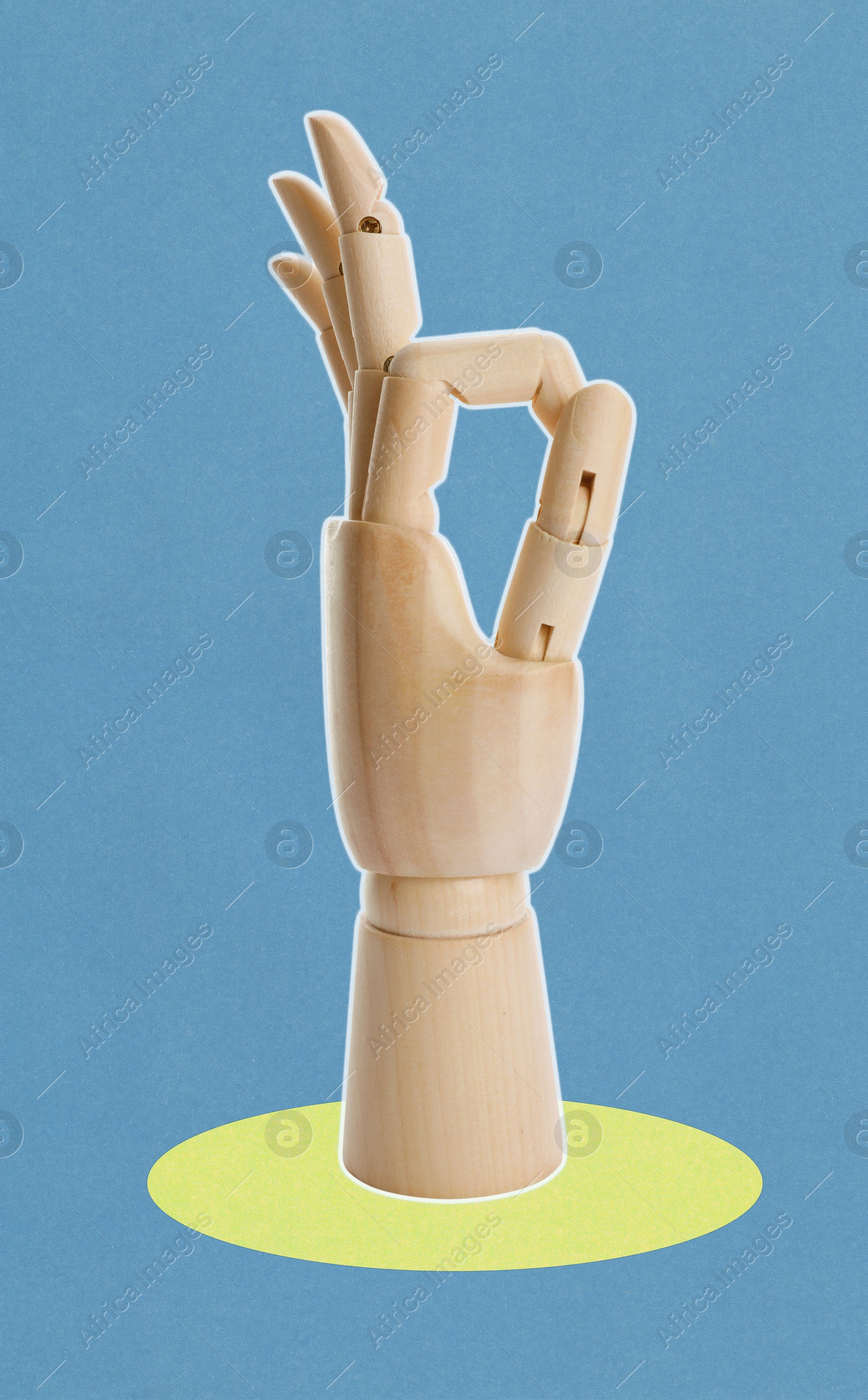 Wooden mannequin hand showing okay gesture on blue background Image of Wooden mannequin hand showing okay gesture on blue background