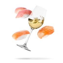 Image of Wine in glass and nigiri sushi falling on white background
