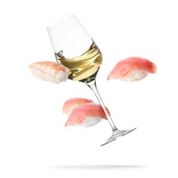 Image of Wine in glass and nigiri sushi falling on white background