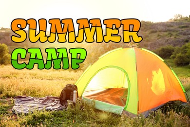 Image of Summer camp, seasonal vacation. Tent and tourist equipment in nature