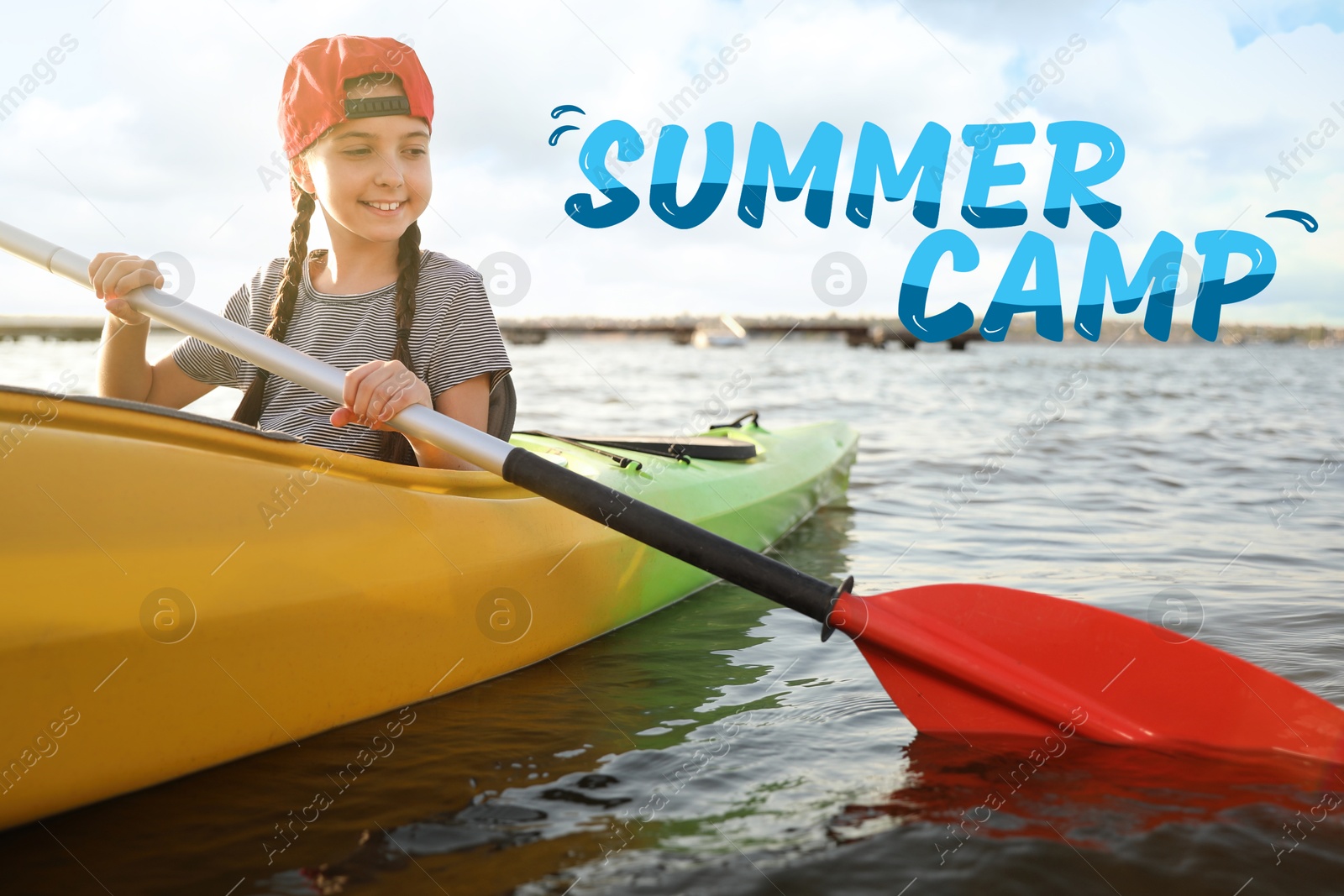 Summer camp, seasonal vacation. Happy girl kayaking on river Image of Summer camp, seasonal vacation. Happy girl kayaking on river