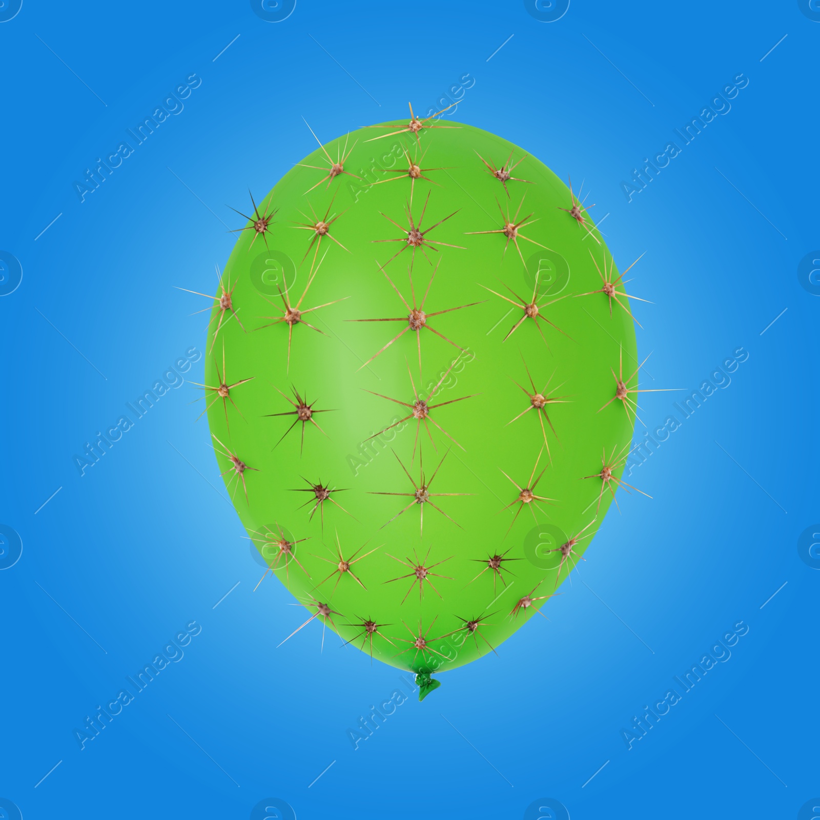 Image of Green balloon covered with cactus prickles on blue background
