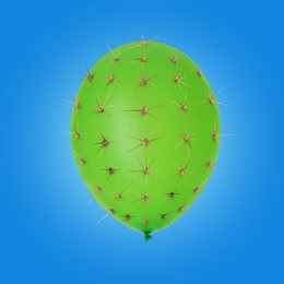 Image of Green balloon covered with cactus prickles on blue background