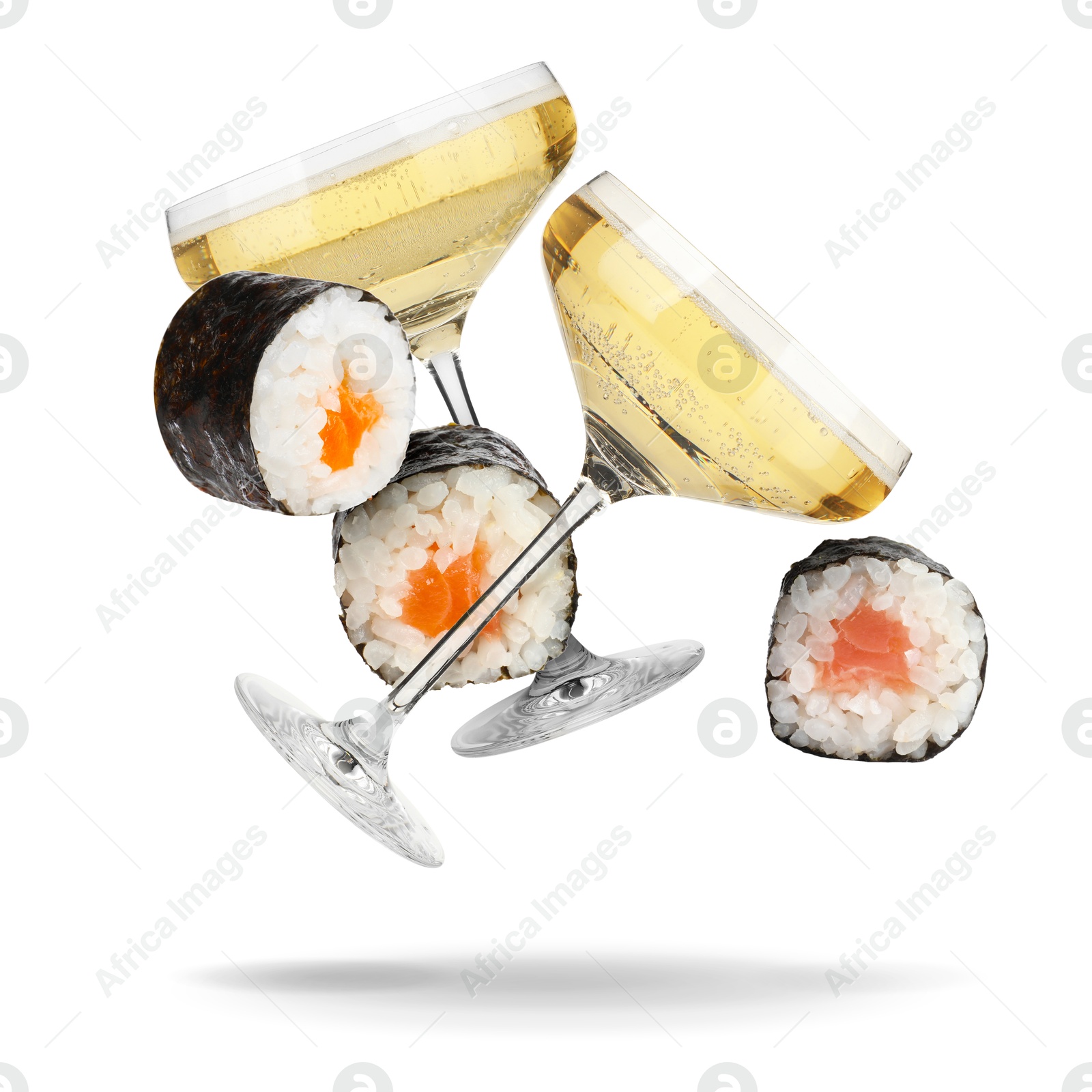 Image of Sparkling wine in glasses and sushi rolls falling on white background
