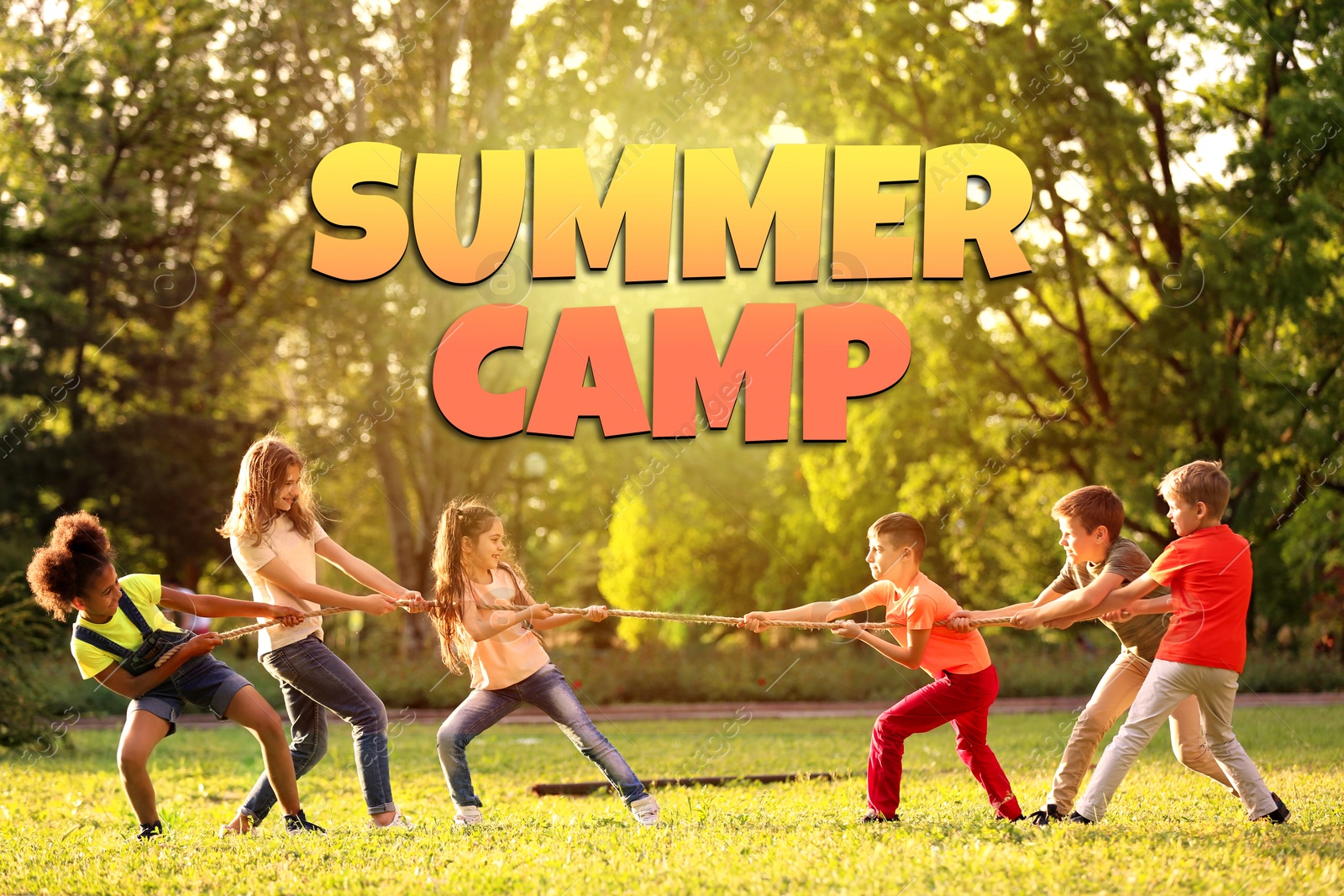 Image of Summer camp, seasonal vacation. Cute children playing tug of war outdoors on sunny day