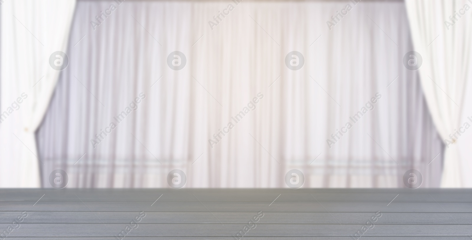 Image of Empty grey wooden table against windows with curtains in room, banner design