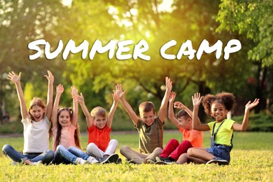 Image of Summer camp, seasonal vacation. Cute children sitting on grass outdoors on sunny day