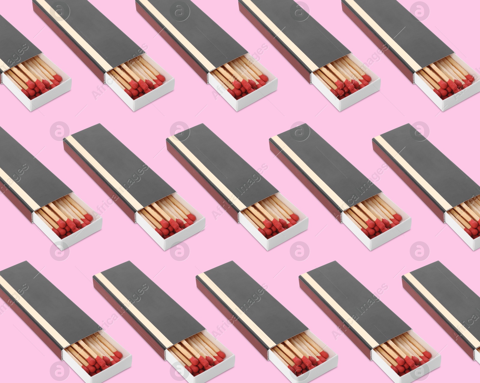 Cardboard box with matches on pink background, pattern design Image of Cardboard box with matches on pink background, pattern design