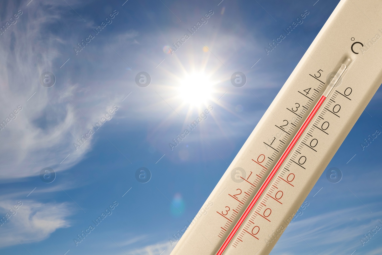 Extremely high temperature on thermometer against blue sky on sunny day. Summer weather Image of Extremely high temperature on thermometer against blue sky on sunny day. Summer weather