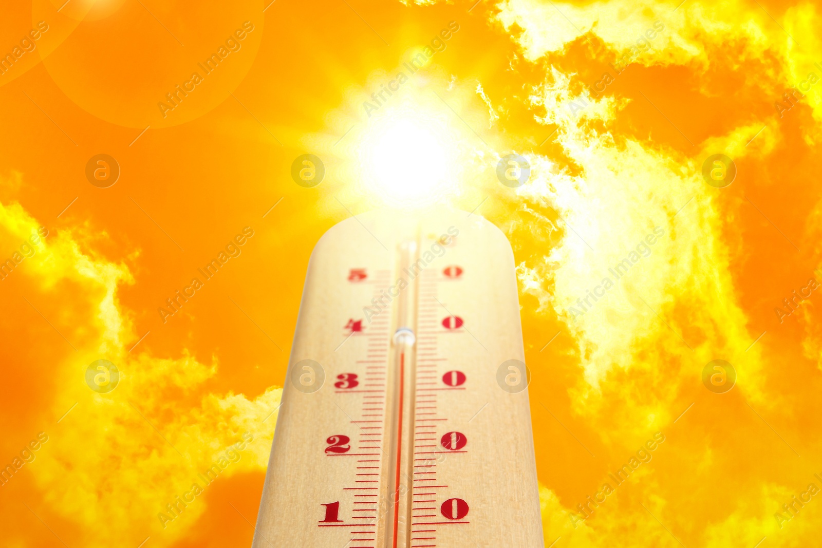 High temperature on thermometer against orange sky on sunny day. Hot summer weather Image of High temperature on thermometer against orange sky on sunny day. Hot summer weather