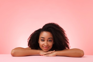Photo of Portrait of beautiful Brazilian woman after spa treatment on pink gradient background