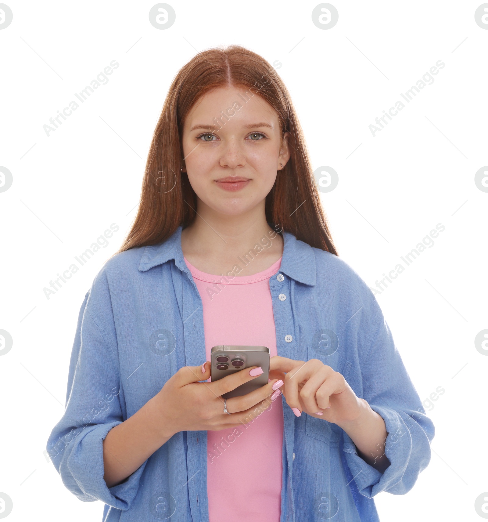 Beautiful teenage girl using smartphone on white background Photo of Beautiful teenage girl using smartphone on white background