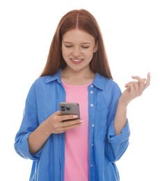 Photo of Smiling teenage girl using smartphone on white background
