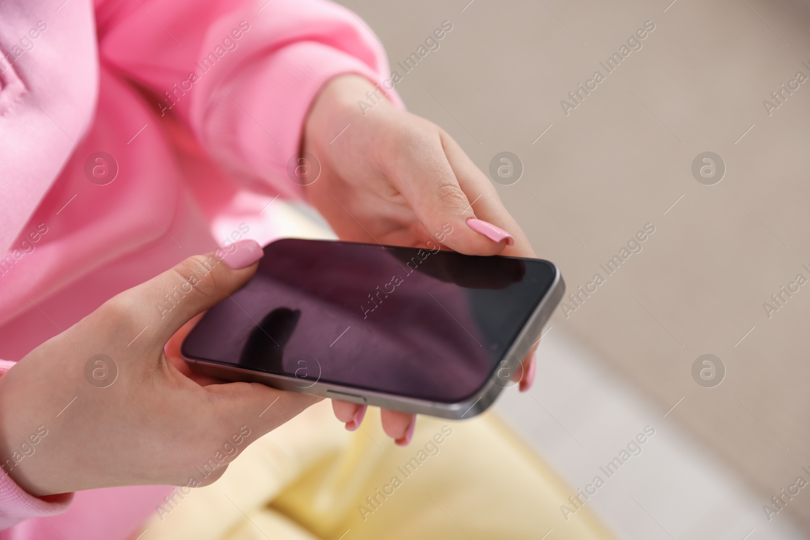 Teenage girl with smartphone at home, closeup Photo of Teenage girl with smartphone at home, closeup