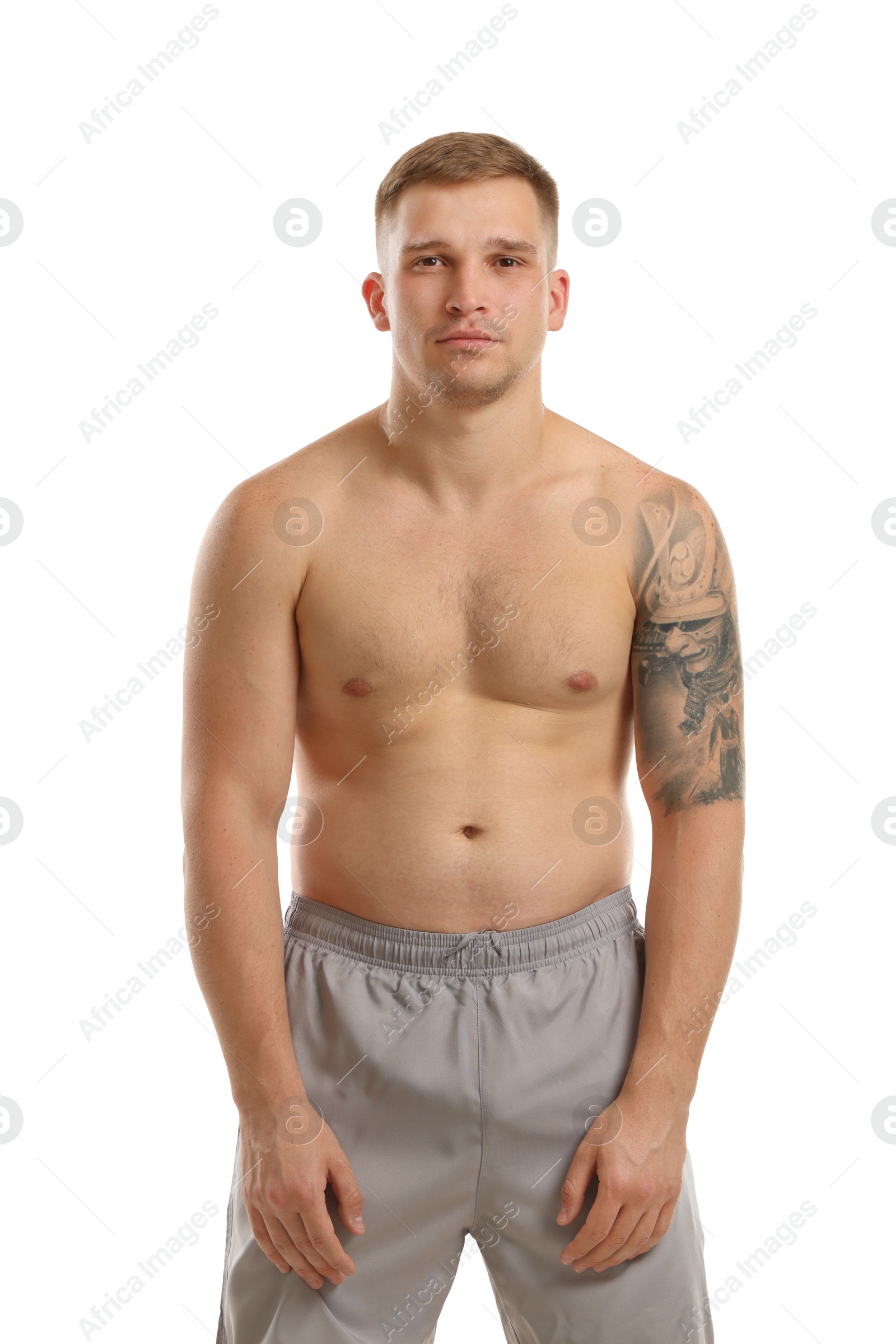 Photo of Handsome young man posing on white background