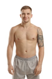 Photo of Handsome young man posing on white background