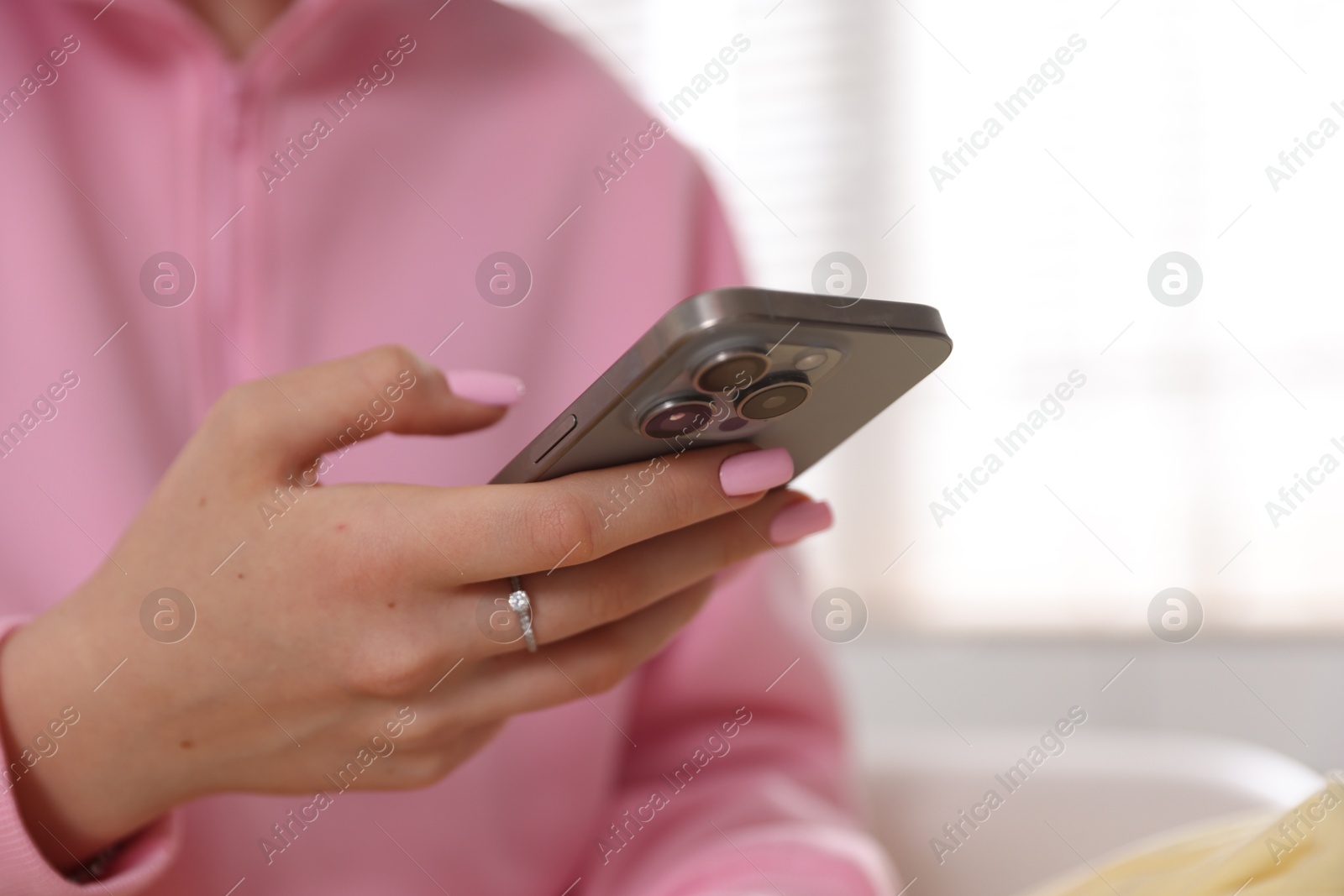 Teenage girl with smartphone at home, closeup Photo of Teenage girl with smartphone at home, closeup